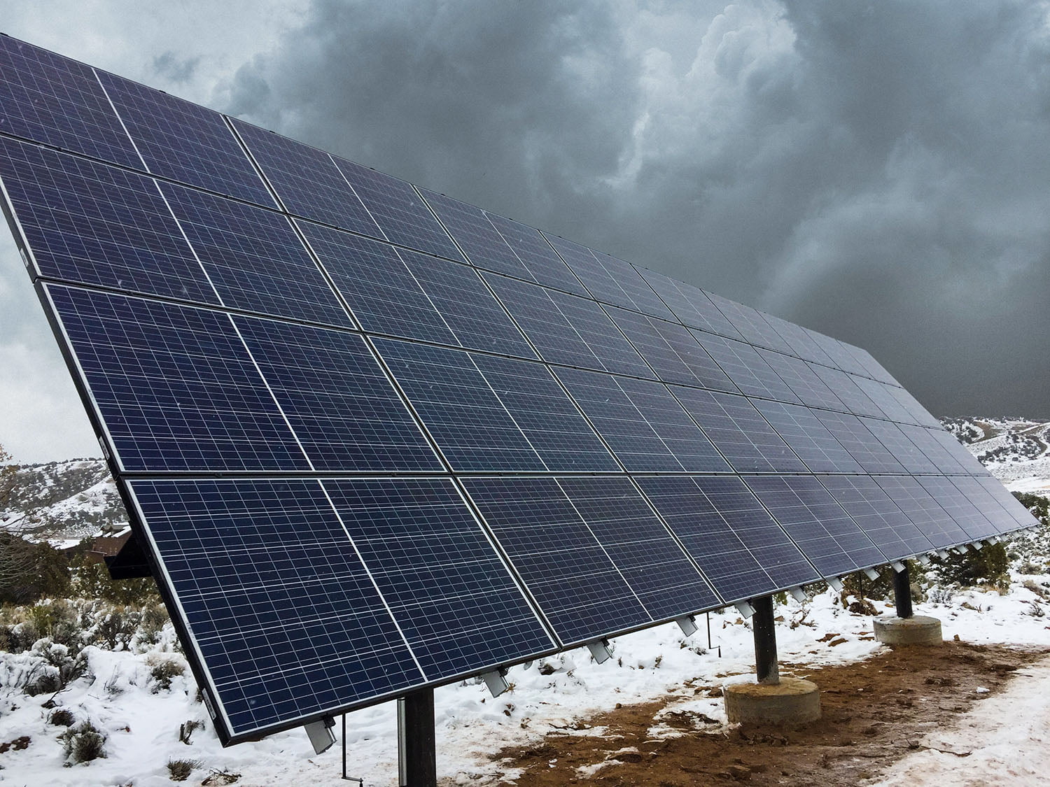 Ground mount solar panels during winter storm